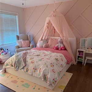 Pink Canopy Bed with Unicorn Plush